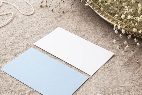 Composition papers beige tablecloth
