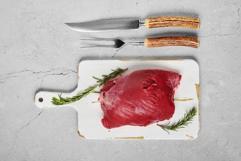 Raw beef shoulder boneless meat on concrete table