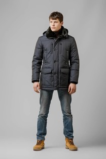 Full length portrait of handsome man in warm winter coat posing in studio