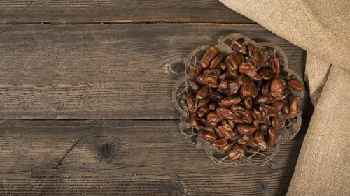 Dates fruit plate wooden table