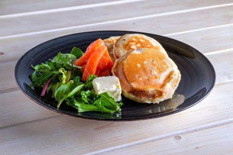 Flapjacks with salmon and fresh salad