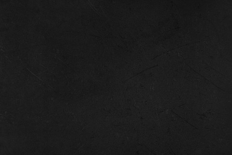 Abstract charcoal textured black background