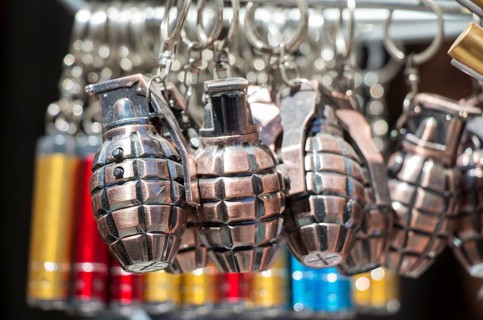 Miniature grenade shaped keychain in the view