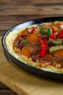 Omelette with paprika and zucchini. Rural breakfast