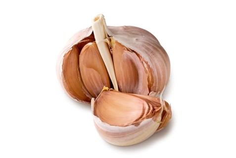 Garlic bulbs with cloves isolated on white background