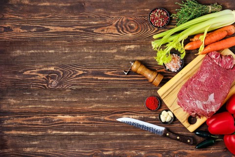 Preparation of beef roll stuffed with vegetables for baking in oven