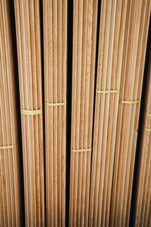 Large rectanguler wood panels stacked up together in display