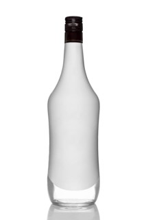 Bottle of alcohol beverage with coconut flavour with reflection on white background
