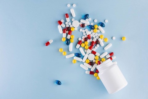 Colorful pills plastic bottle