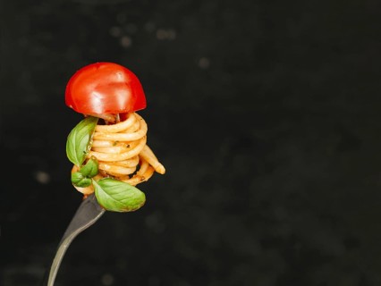Tasty spaghetti wrapped around fork. Resolution and high quality beautiful photo