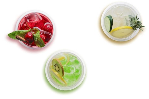 Top view of three glasses with cool lemonade isolated on white background