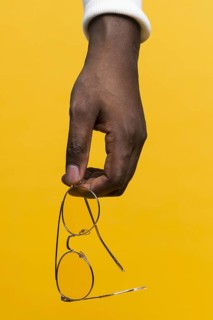 Hand holding glasses