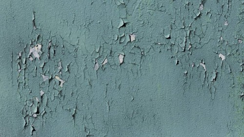 Old blue wall with fallen paint