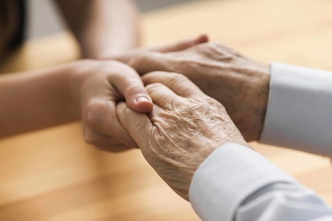 Nurse holding senior man s hands empathy. Resolution and high quality beautiful photo