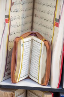 Islamic Holy Book Quran on the market shelf
