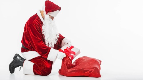 Santa claus putting gift box sack. Resolution and high quality beautiful photo