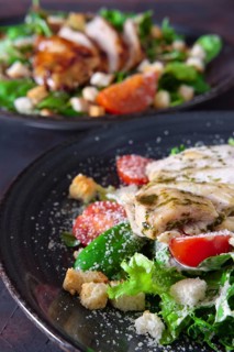 Salad with fried chicken and turkey fillet