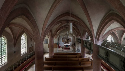 Interior with vault and altar of the late Gothic hall church from 1488