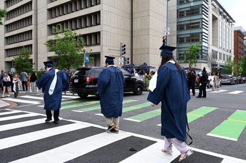 College students of George Washington University in the traditional robe and mortarboard on their graduation day