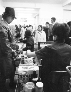 The work of a housewife and mother shopping for groceries at the supermarket and Aldi