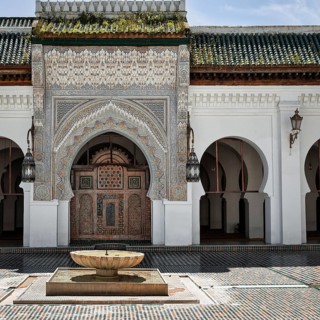 Inner courtyard with fountain and gate