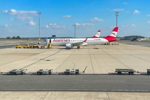 Aircraft Passenger aircraft Jets Jets of Austrian Airlines stand parked in parking position on flight apron of Vienna-Schwechat Vienna International Airport
