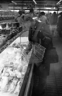 The work of a housewife and mother shopping for groceries at the supermarket and Aldi