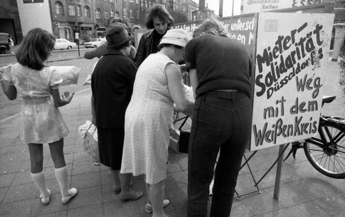 Tenants protest with a collection of signatures