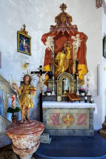 Side altar with baptismal font