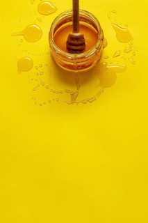 Jar with honey table with copy space