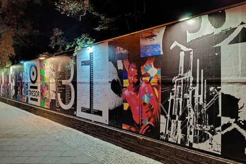 Illuminated wall at the techno club safe at night