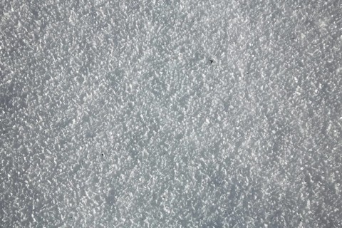 Structure with snow with ice crystals