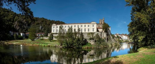 Lavoute Chilhac labelled Les Plus Beaux Villages de FrancePriory Sainte-Croix reflecting in the river Allier