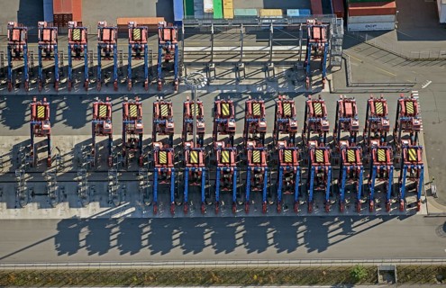Aerial view of the straddle carrier fleet at Tollerort in the Port of Hamburg