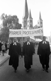 Those who support the Vietnam War betray the gospel of love. Pastors protest. With these slogans and sometimes wearing their robes