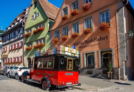 Decorated vintage bus in front of the house of Kaethe Wohlfahrt Christmas Village