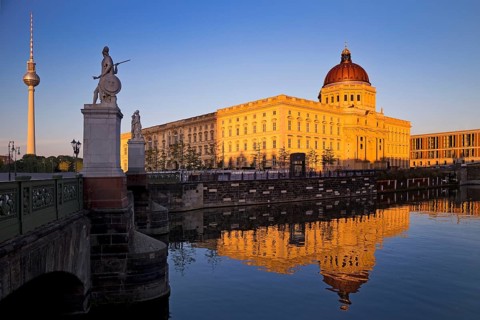 Humboldt Forum with Palace Bridge and TV Tower in late evening light