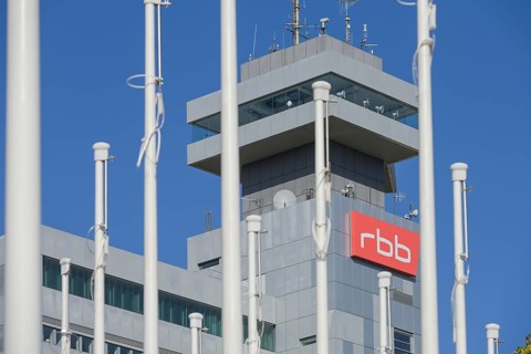 Flagpoles in front of the fairground