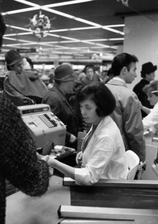 The work of a housewife and mother shopping for groceries at the supermarket and Aldi