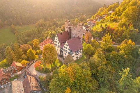 Berneck Castle in autumn at sunset