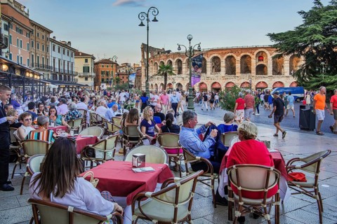Restaurant terraces in Piazza Bra in front of the Arena di Verona