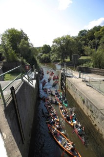 Lock with canoeist on the Lahn at the shipping tunnel