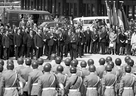 With full military honours