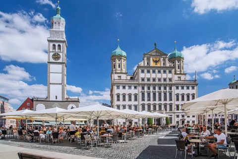 Restaurant terraces on the town hall square with Perlachturm and town hall