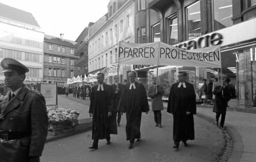Those who support the Vietnam War betray the gospel of love. Pastors protest. With these slogans and sometimes wearing their robes