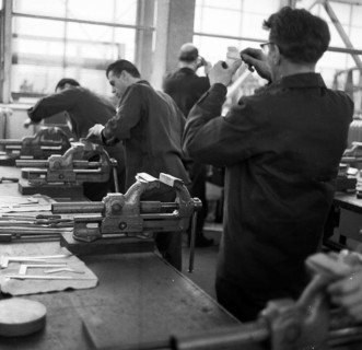 Older workers are retrained in metal trades as locksmiths and lathe operators in the Krupp AG workshops in Bochum in 1967