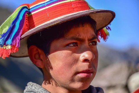 Boy in traditional dress of the Quechua Indians