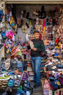 Vendor of shoes in his stall