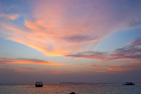 Altostratus clouds illuminated by setting sun at sunset