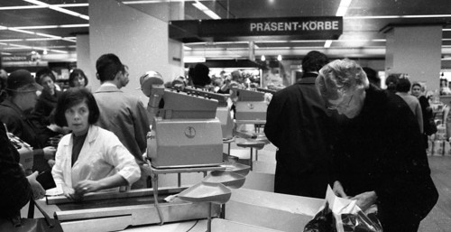 The work of a housewife and mother shopping for groceries at the supermarket and Aldi